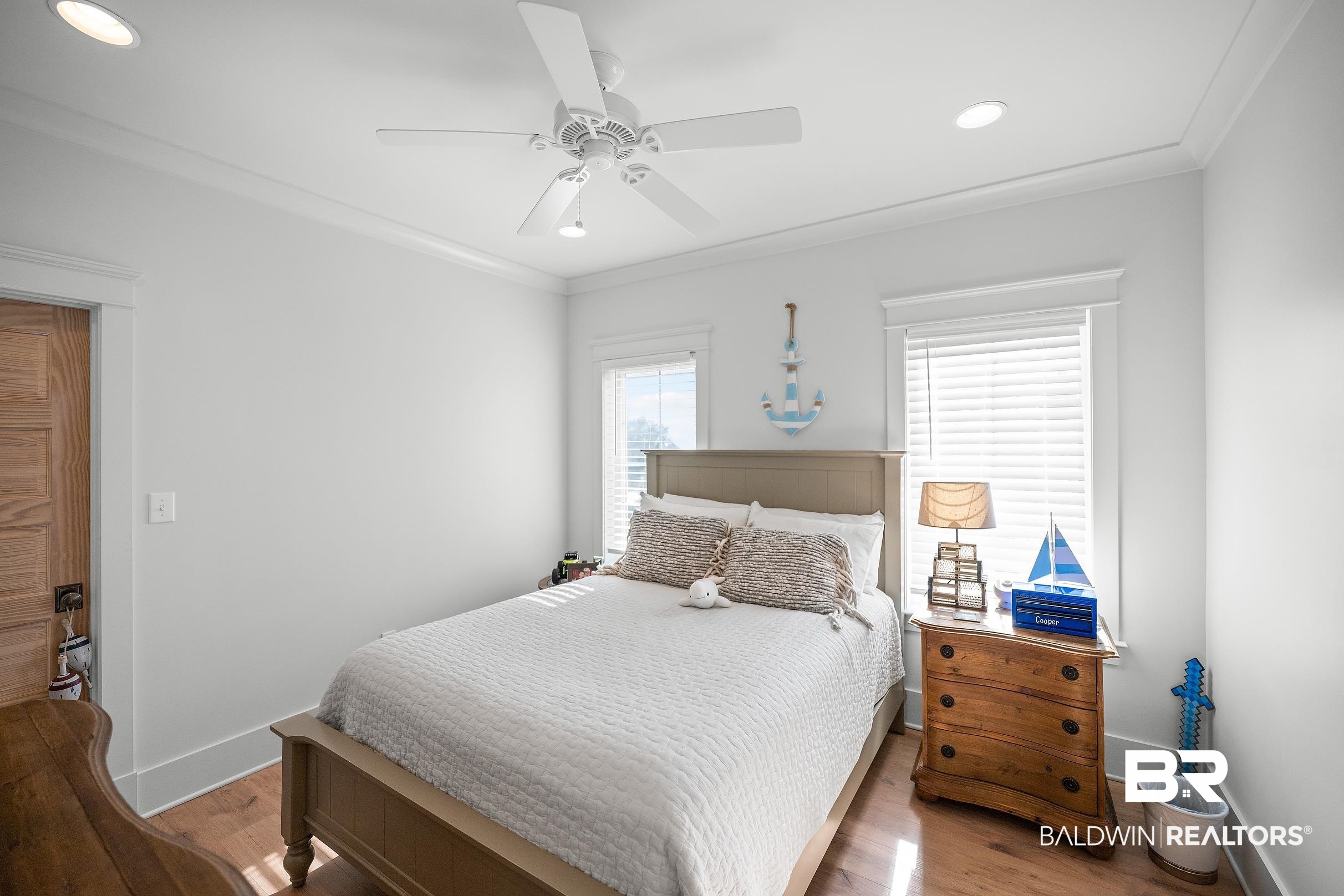33186 Marlin Key Drive Orange Beach, AL 36561 - Photo 69 of 87 Bedroom with ornamental molding, wood finished floors, a ceiling fan, and recessed lighting
