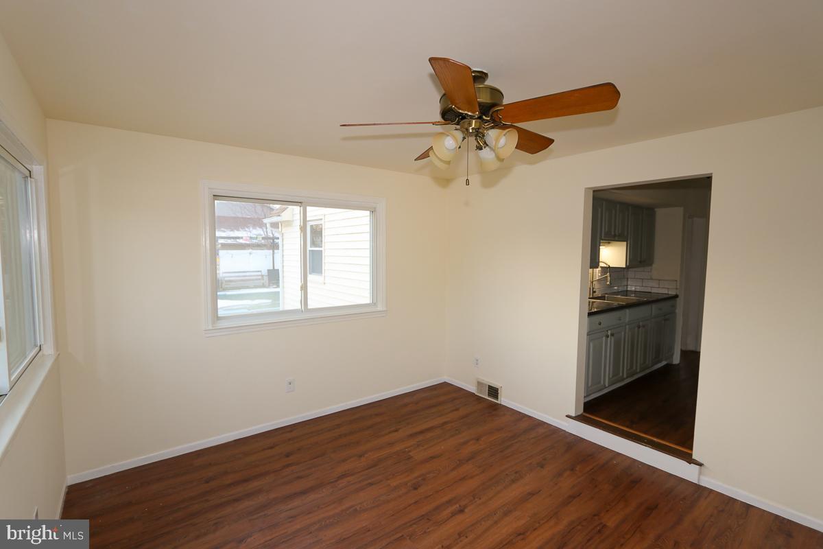 201 Castello Avenue Hatboro, PA 19040 - Photo 15 of 64 a view of empty room with wooden floor and ceiling fan