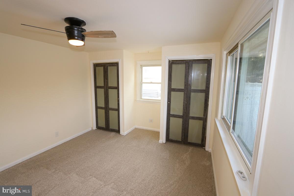 201 Castello Avenue Hatboro, PA 19040 - Photo 21 of 64 a view of an empty room with glass door