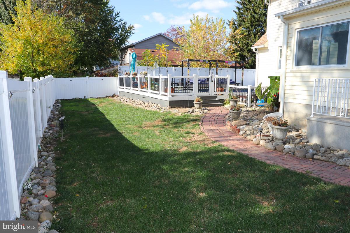 201 Castello Avenue Hatboro, PA 19040 - Photo 52 of 62 a view of house with backyard and outdoor seating
