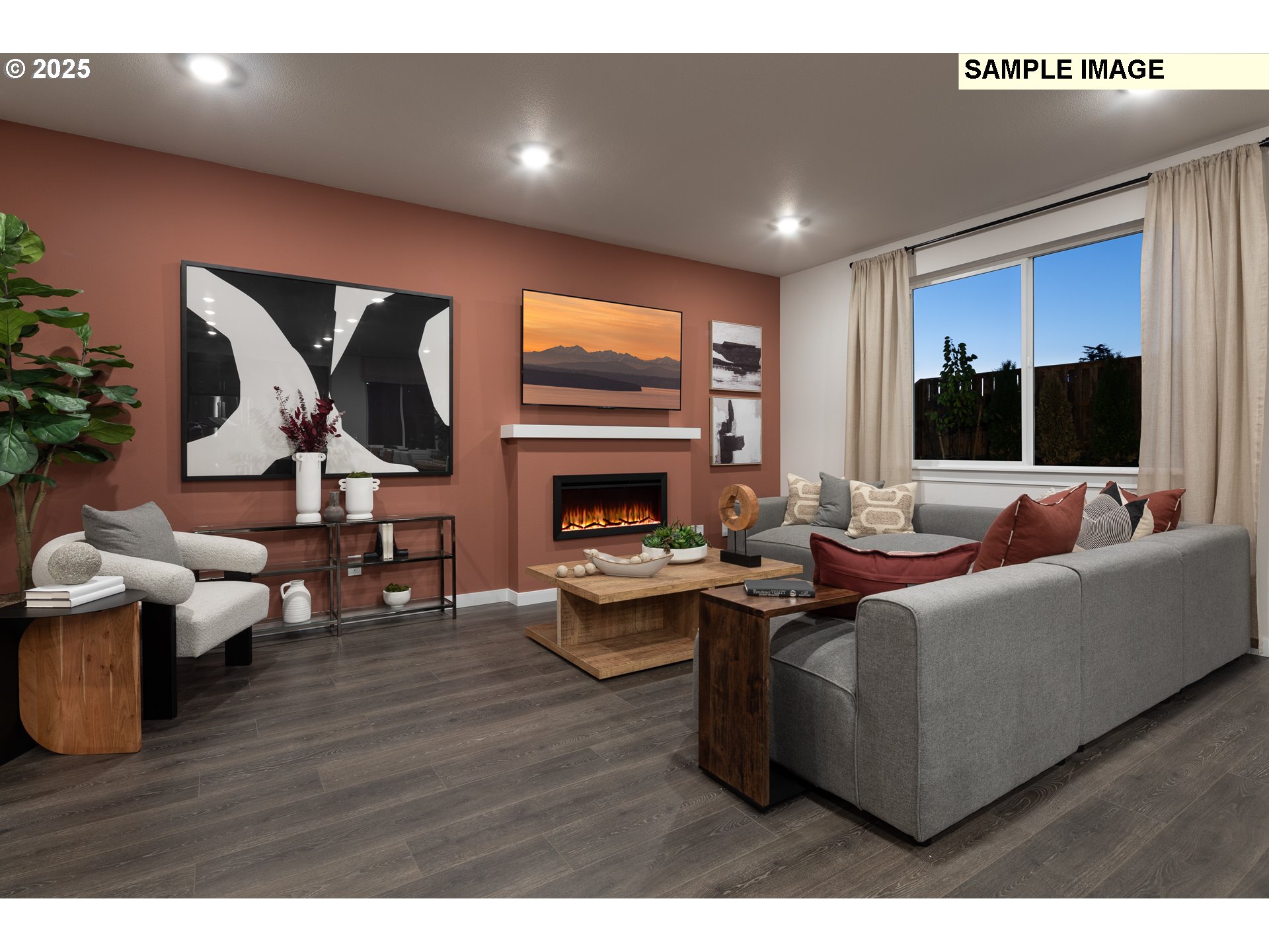 3777 Southwest 37th Street Gresham, OR 97080 - Photo 5 of 12 a living room with fireplace furniture and a flat screen tv