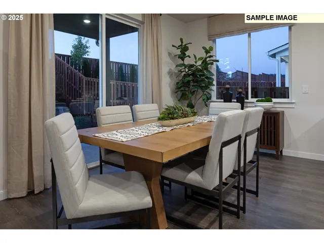 a view of an outside dining space with furniture