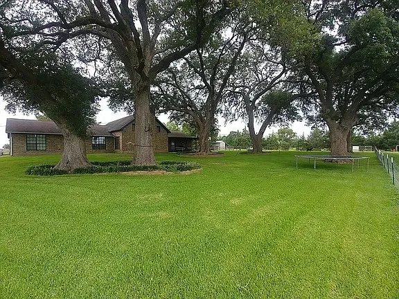 a house view with a outdoor space