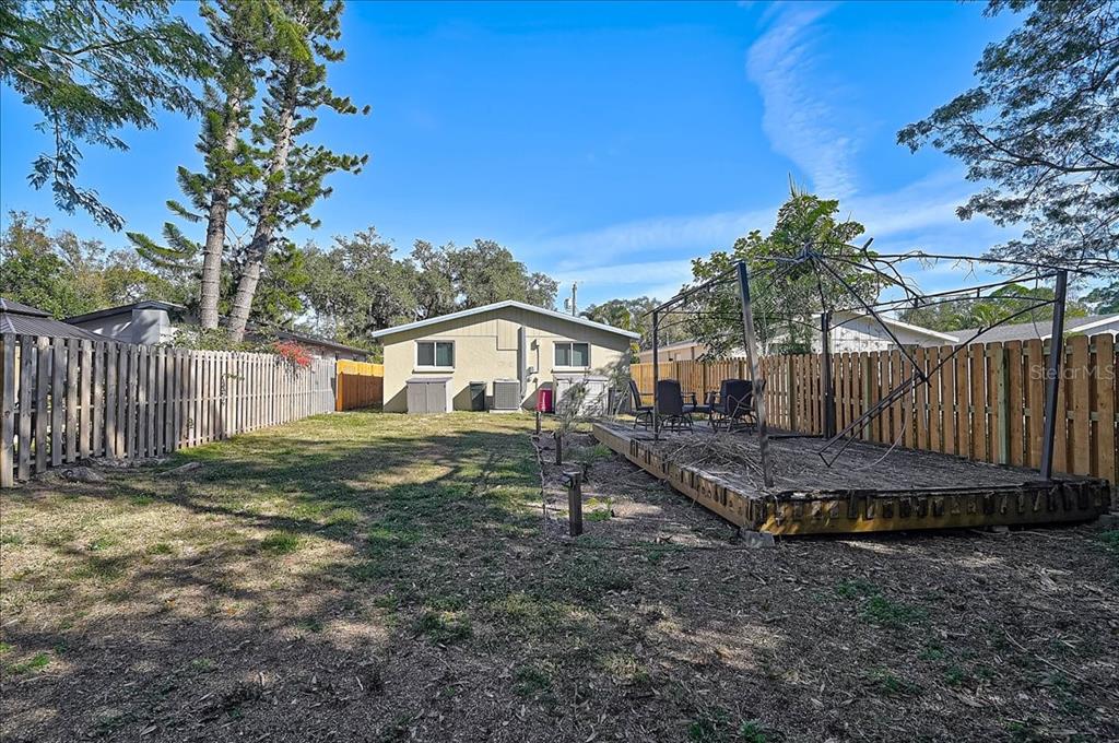 4514 South Lockwood Ridge Road Sarasota, FL 34231 - Photo 20 of 35 a view of a house with a yard