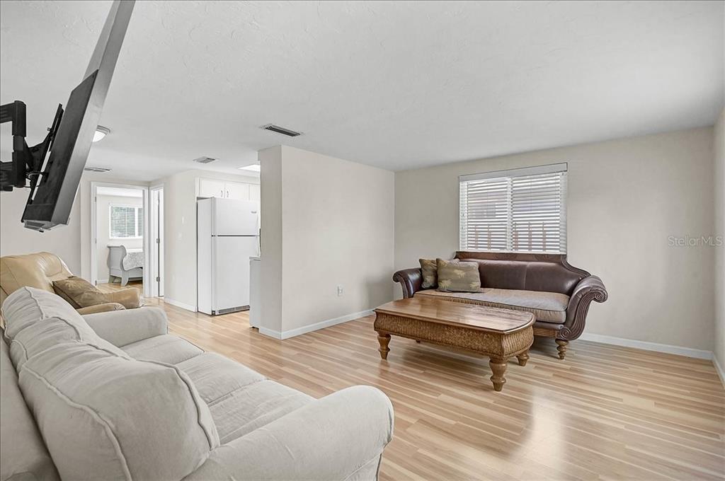 4514 South Lockwood Ridge Road Sarasota, FL 34231 - Photo 5 of 35 a living room with furniture and a window