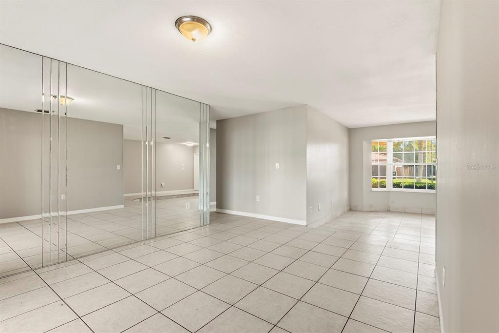 15313 Southwest 138th Terrace Miami, FL 33196 - Photo 19 of 44 a view of an empty room and window