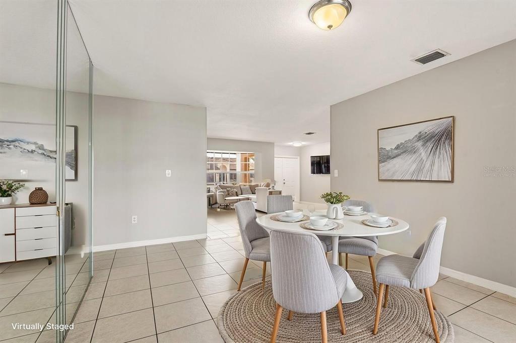 15313 Southwest 138th Terrace Miami, FL 33196 - Photo 2 of 44 a view of a dining room with furniture