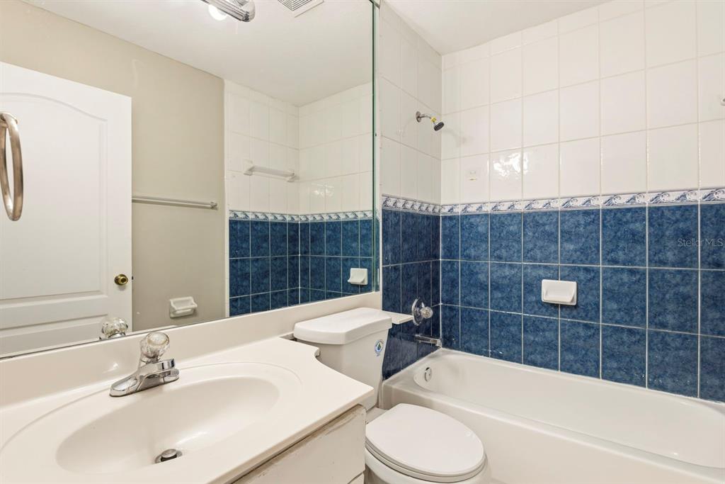 15313 Southwest 138th Terrace Miami, FL 33196 - Photo 32 of 44 a bathroom with a sink toilet and shower