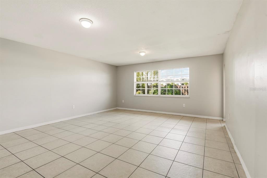 15313 Southwest 138th Terrace Miami, FL 33196 - Photo 33 of 44 an empty room with windows