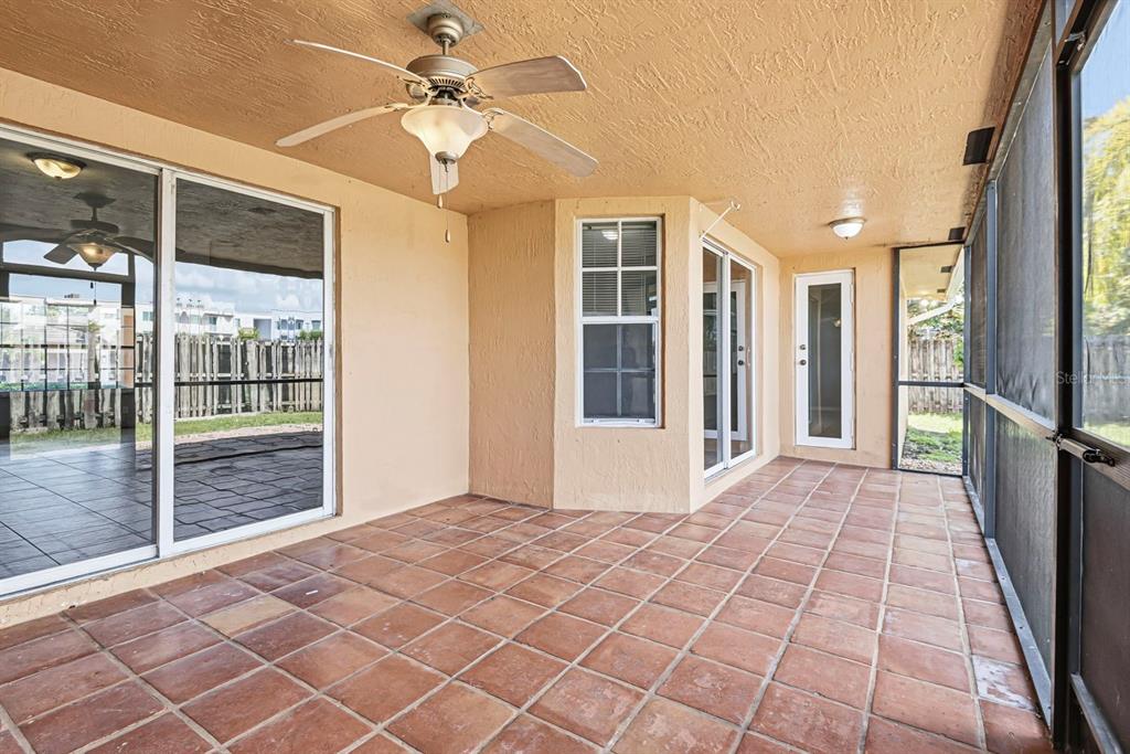 15313 Southwest 138th Terrace Miami, FL 33196 - Photo 40 of 44 a view of a hallway with windows