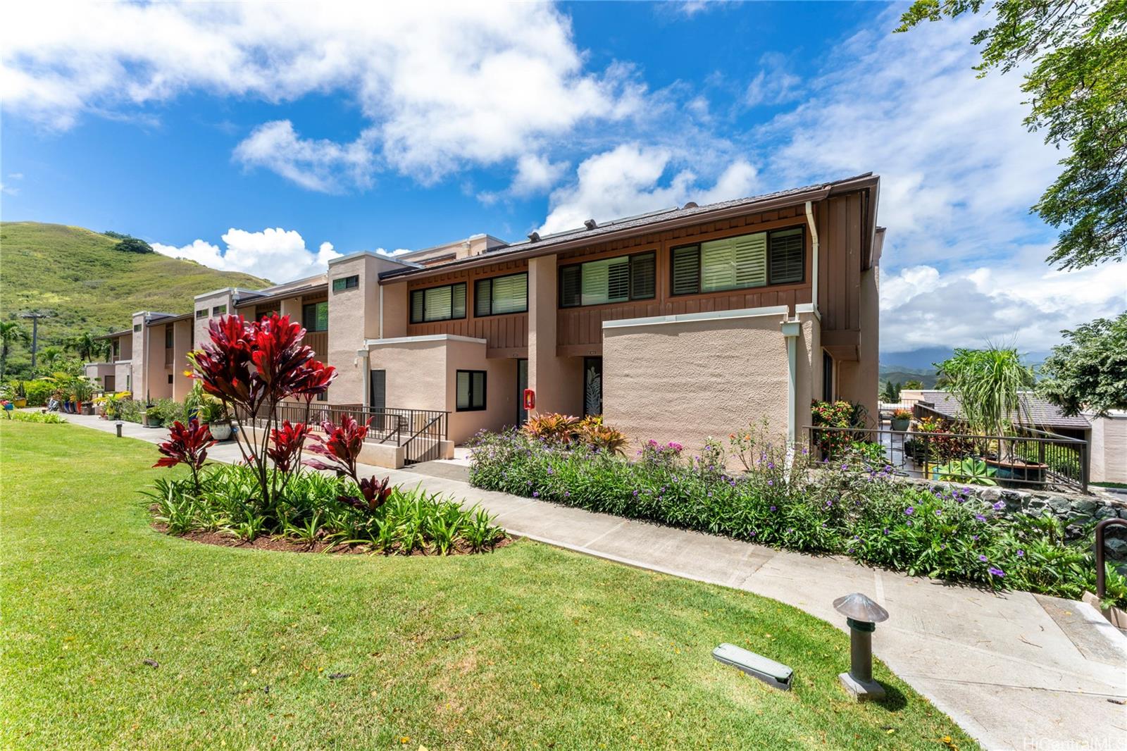 411 Kaelepulu Drive, Unit 1602 Kailua, HI 96734 - Photo 1 of 1 a front view of house with a yard