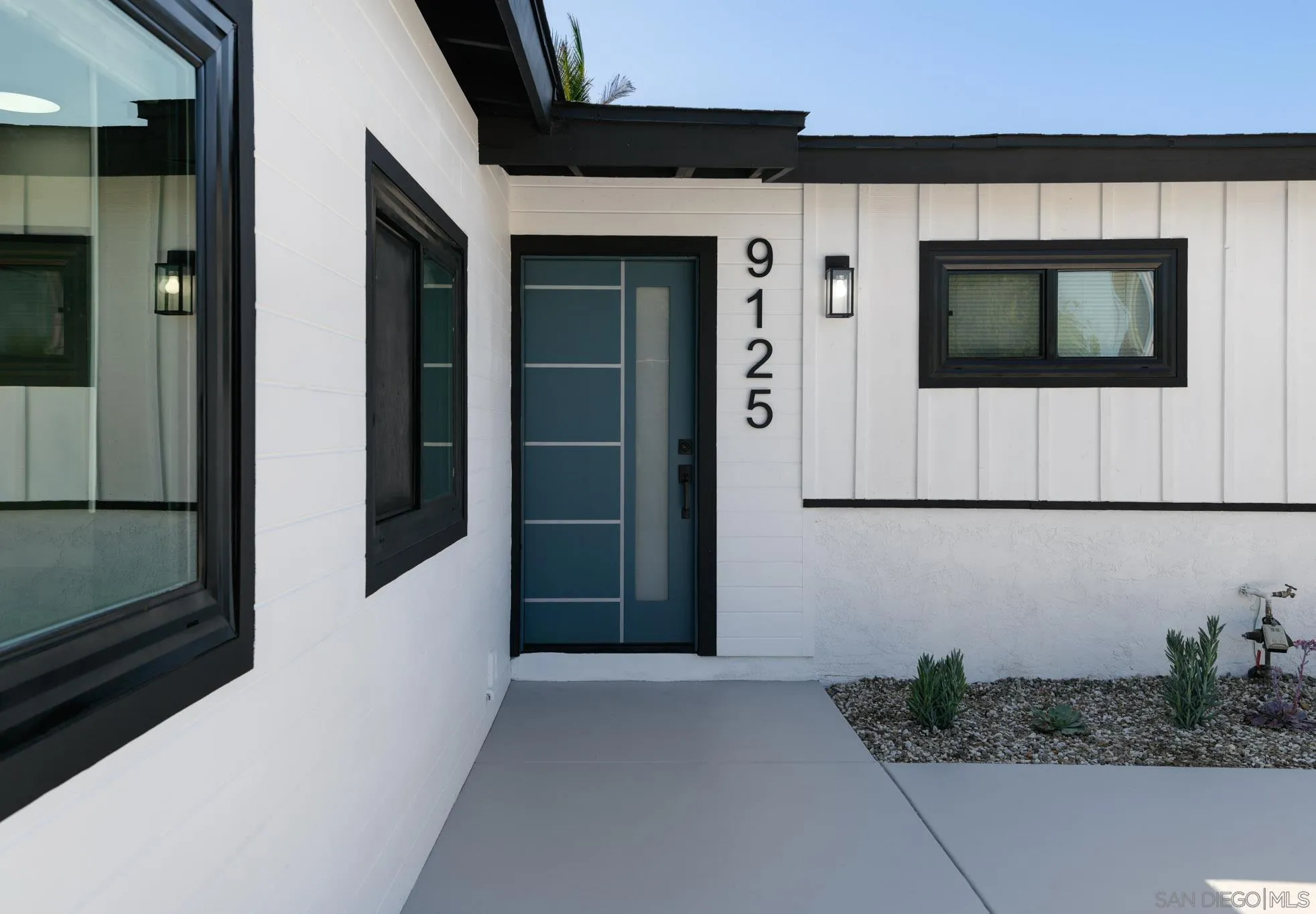 9125 Akard Street Spring Valley, CA 91977 - Photo 2 of 25 a front view of a house with entryway
