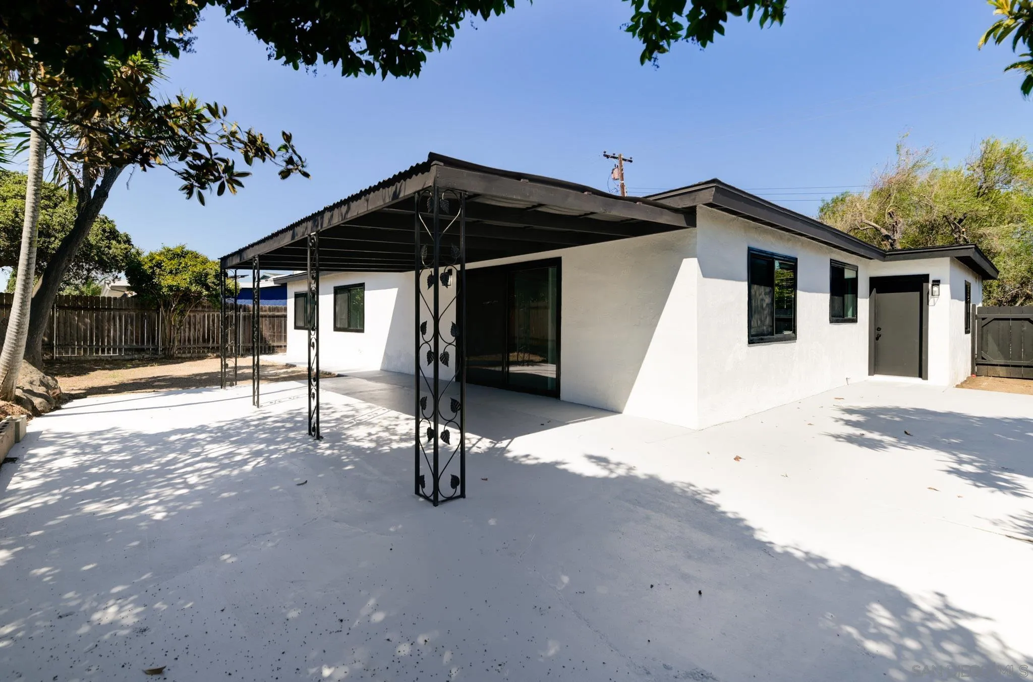 9125 Akard Street Spring Valley, CA 91977 - Photo 22 of 25 a view of a house with a patio