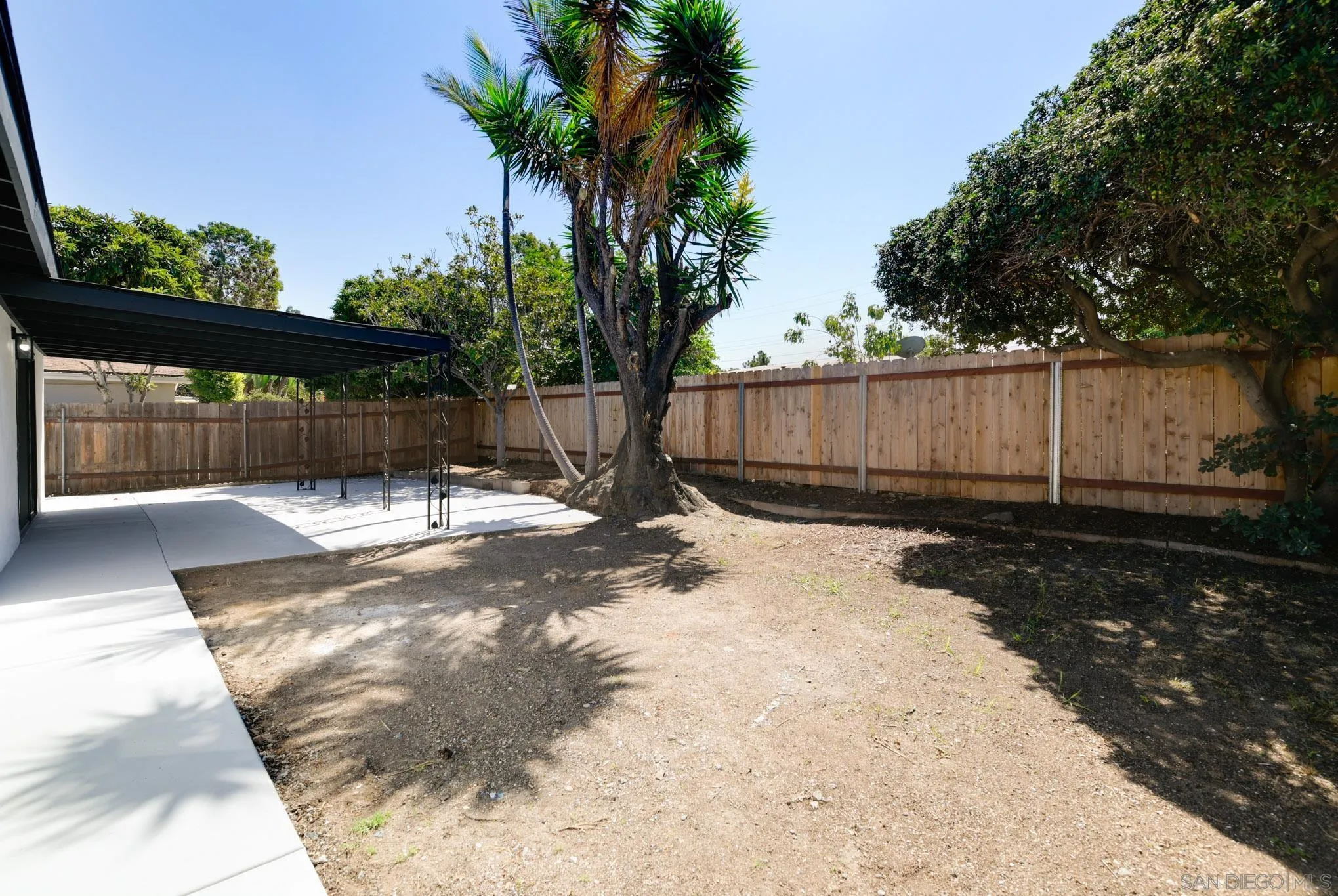 9125 Akard Street Spring Valley, CA 91977 - Photo 23 of 25 a view of a backyard with a tree