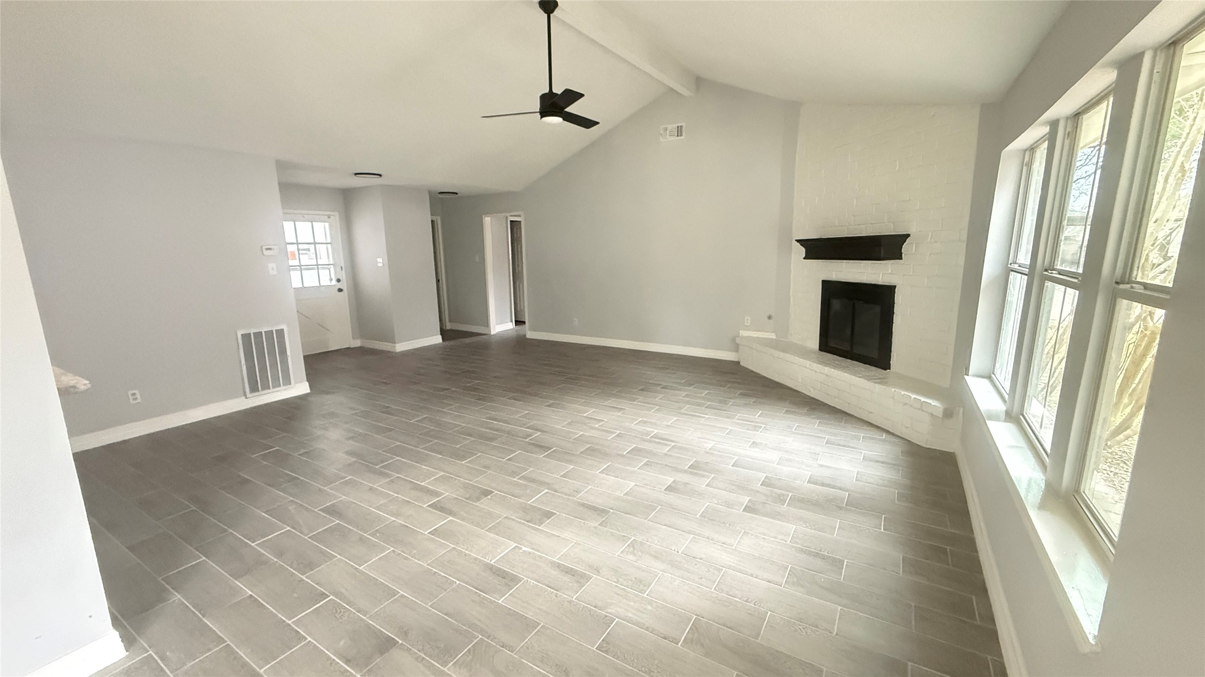 4202 Junker Street Rosenberg, TX 77471 - Photo 4 of 20 a view of a livingroom with a fireplace