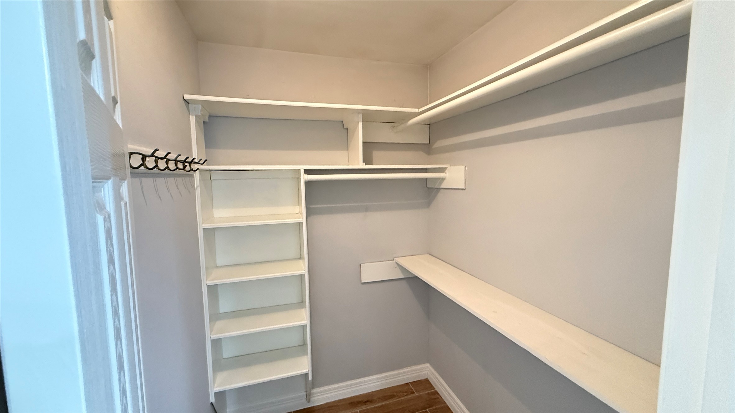 4202 Junker Street Rosenberg, TX 77471 - Photo 8 of 20 a view of an empty walk in closet