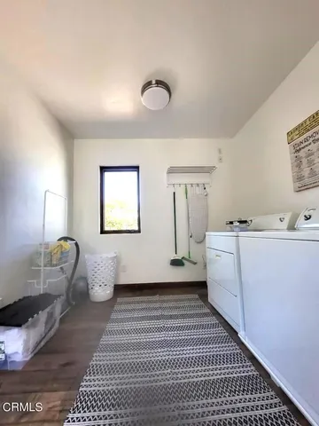 a view of a room with a lounge chair