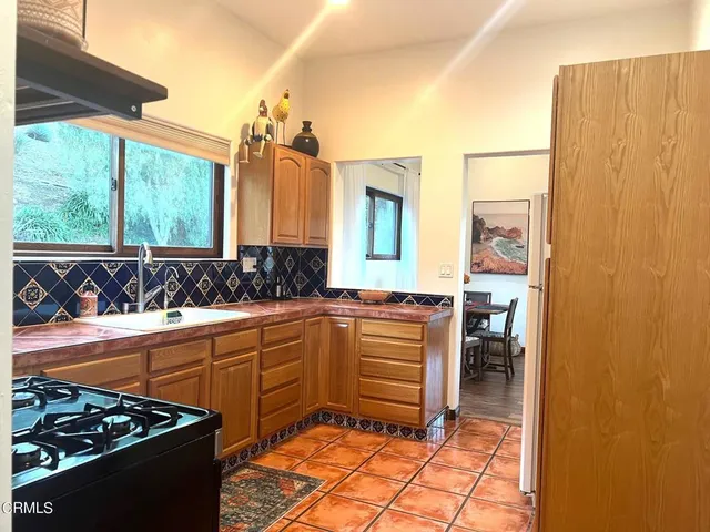 a bathroom with a sink and a large mirror