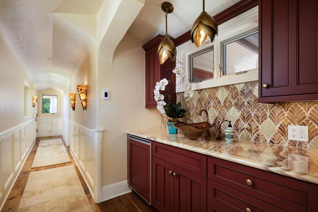a bathroom with a sink and mirror