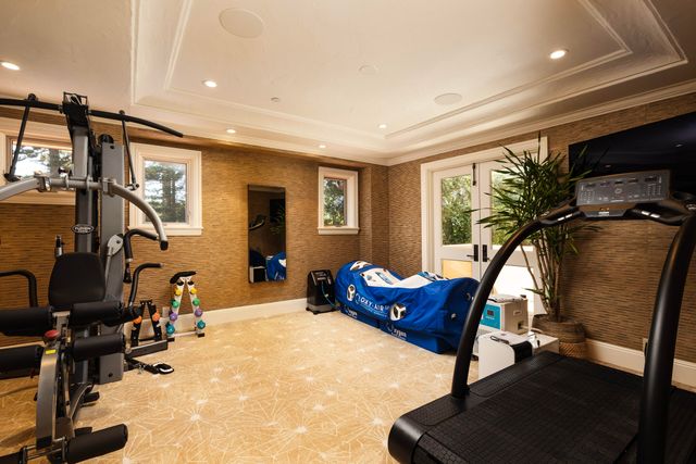 a room with furniture and air hockey table