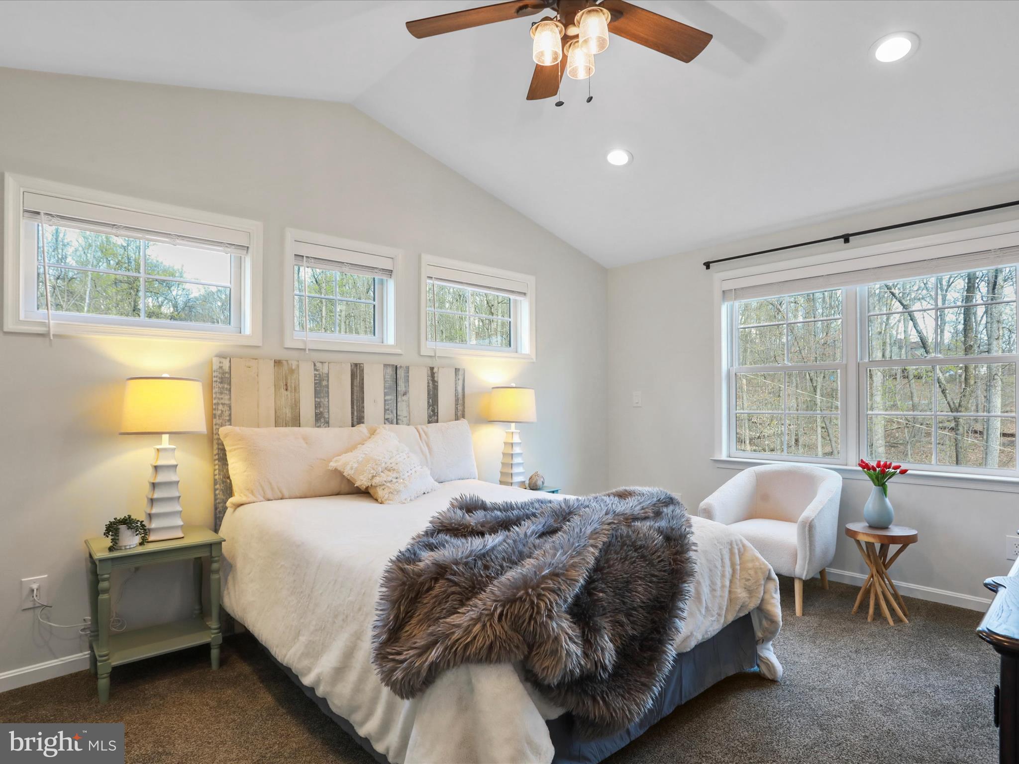 19 Spring Trail Fairfield, PA 17320 - Photo 48 of 71 a spacious bedroom with a bed and a chandelier