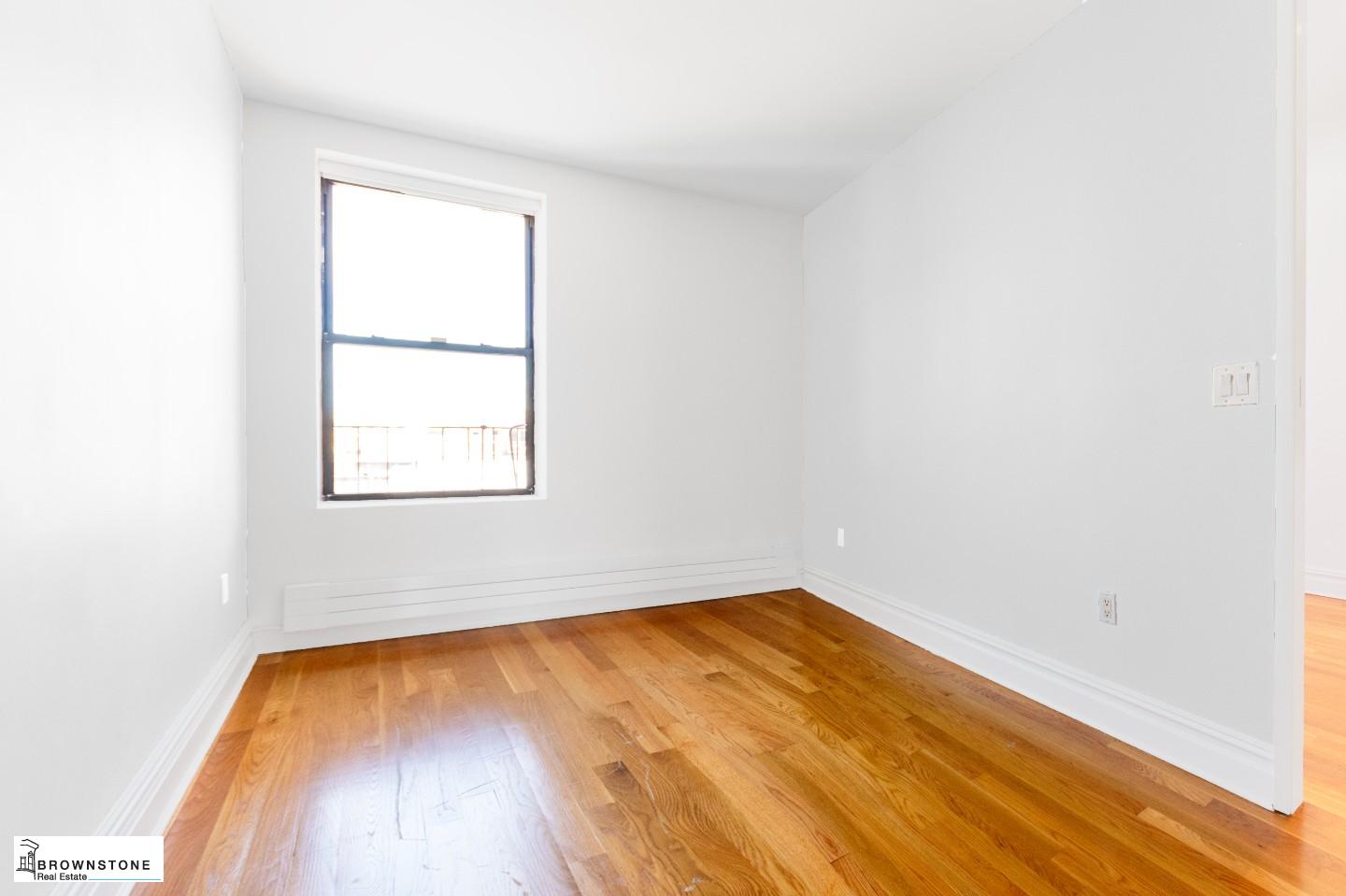 203 Luquer Street, Unit 4B Brooklyn, NY 11231 - Photo 4 of 6 an empty room with a window