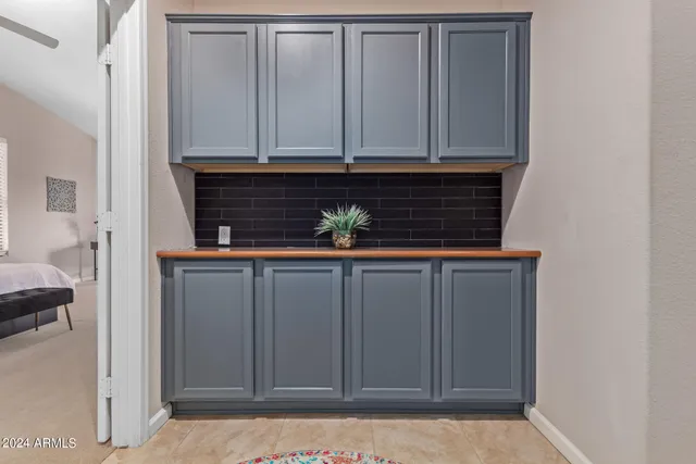 a view of cabinets and wooden floor