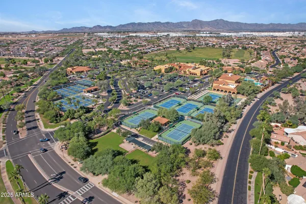 an aerial view of city and green space