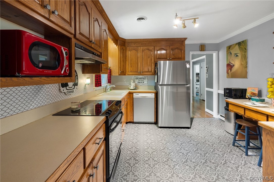 9505 Beach Road Chesterfield, VA 23838 - Photo 11 of 32 a kitchen with stainless steel appliances granite countertop a refrigerator and a stove top oven
