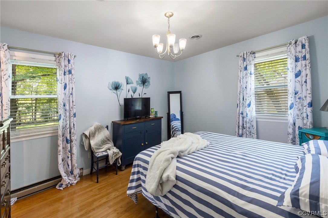 9505 Beach Road Chesterfield, VA 23838 - Photo 20 of 32 a bedroom with a bed and a window