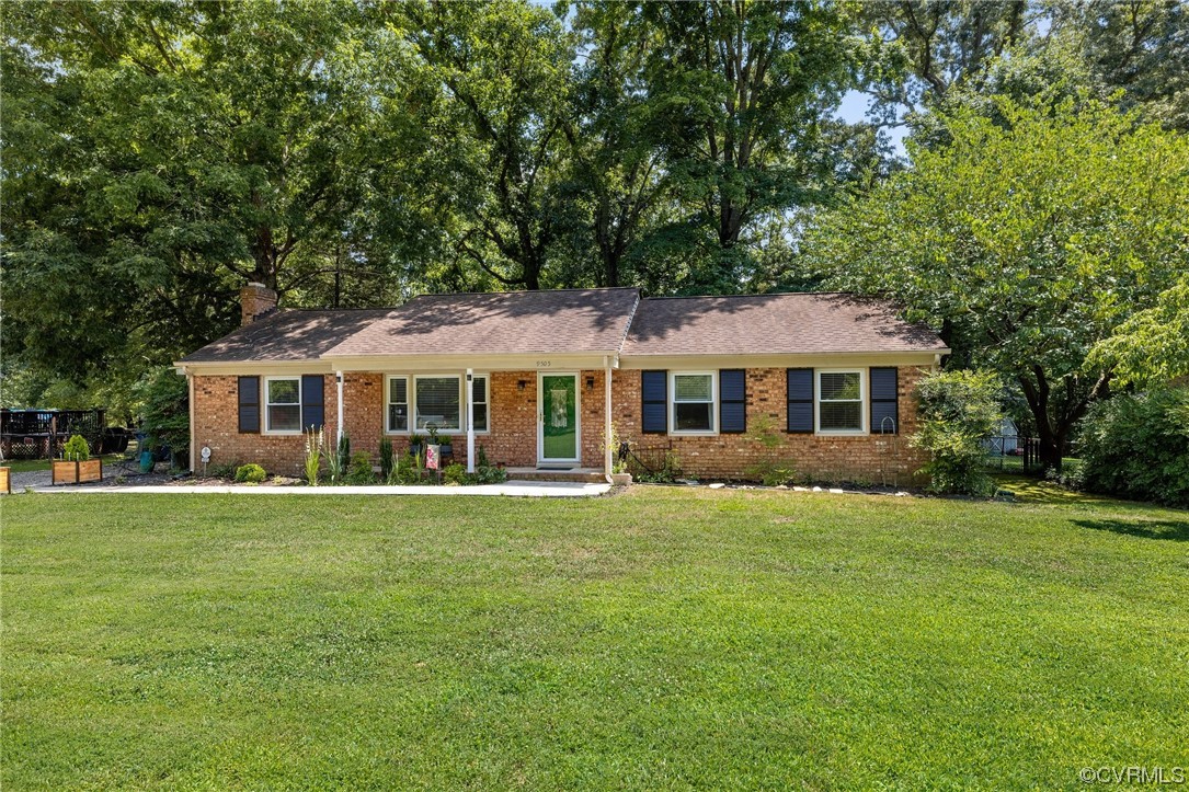 9505 Beach Road Chesterfield, VA 23838 - Photo 2 of 32 a front view of a house with a garden