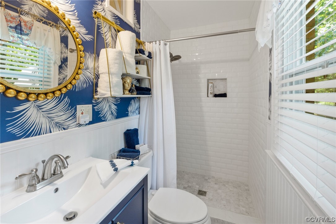 9505 Beach Road Chesterfield, VA 23838 - Photo 21 of 32 a bathroom with a sink and a mirror