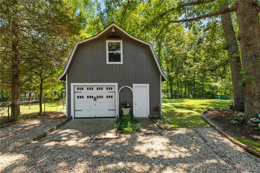 9505 Beach Road Chesterfield, VA 23838 - Photo 25 of 32 a front view of a house with garden
