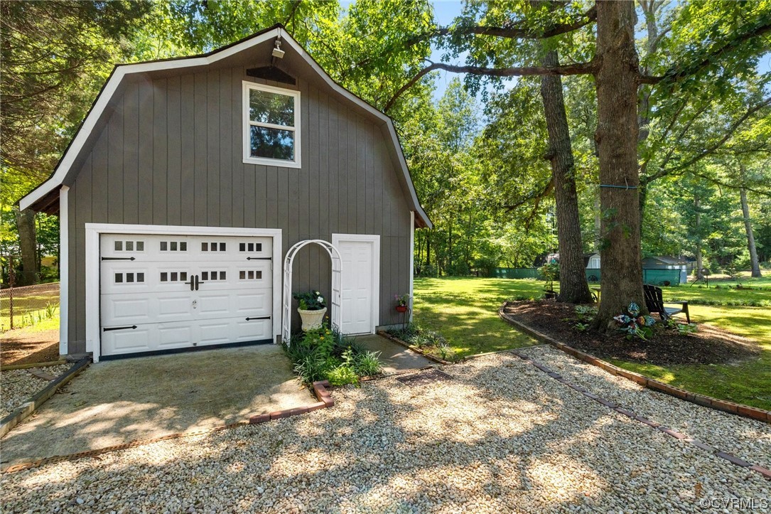 9505 Beach Road Chesterfield, VA 23838 - Photo 26 of 32 a view of a house with backyard and trees