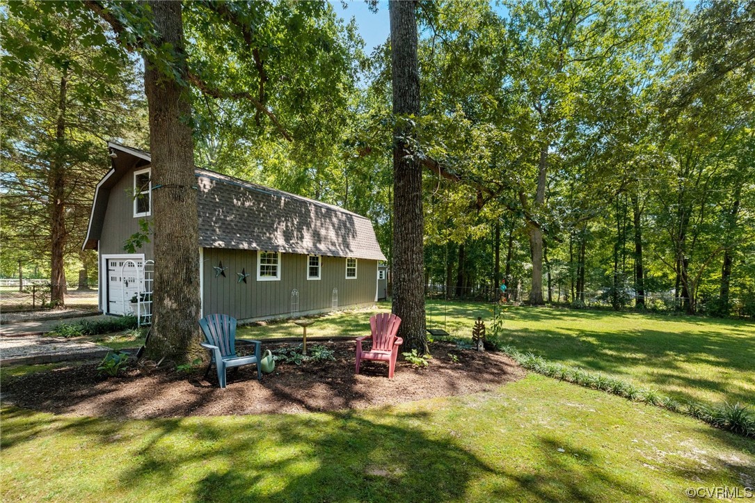 9505 Beach Road Chesterfield, VA 23838 - Photo 29 of 32 a view of a house with backyard porch and sitting area
