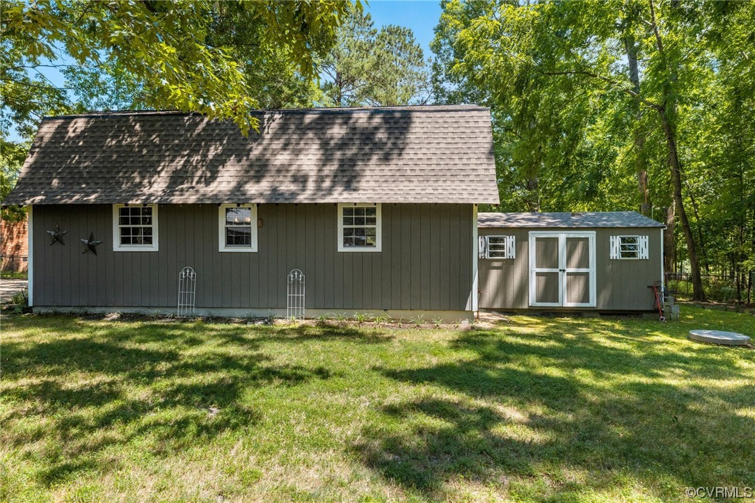 9505 Beach Road Chesterfield, VA 23838 - Photo 30 of 32 a backyard of a house with yard and outdoor seating
