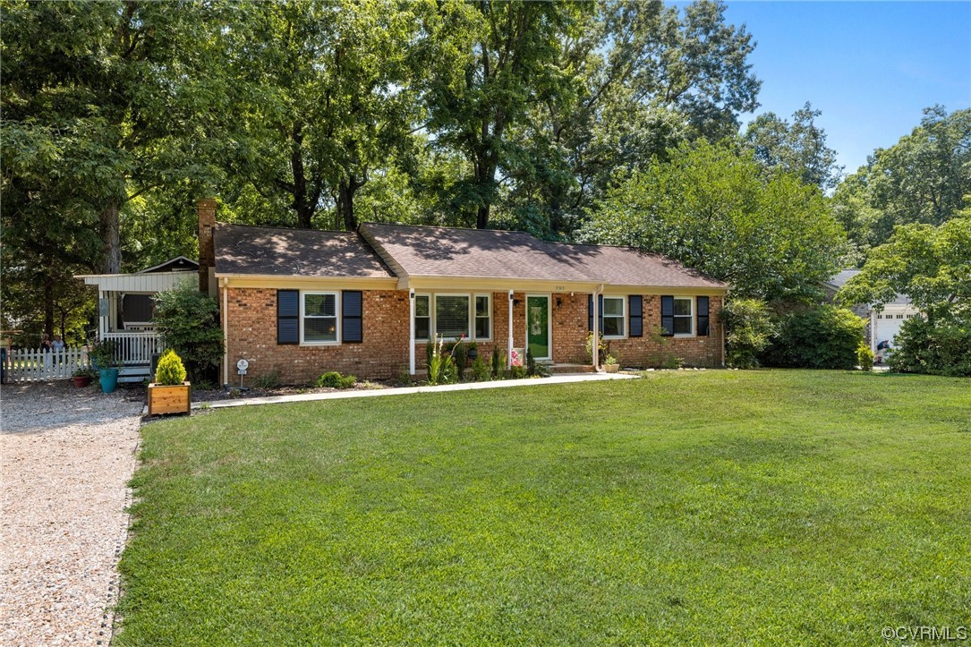 9505 Beach Road Chesterfield, VA 23838 - Photo 3 of 32 a front view of a house with a garden