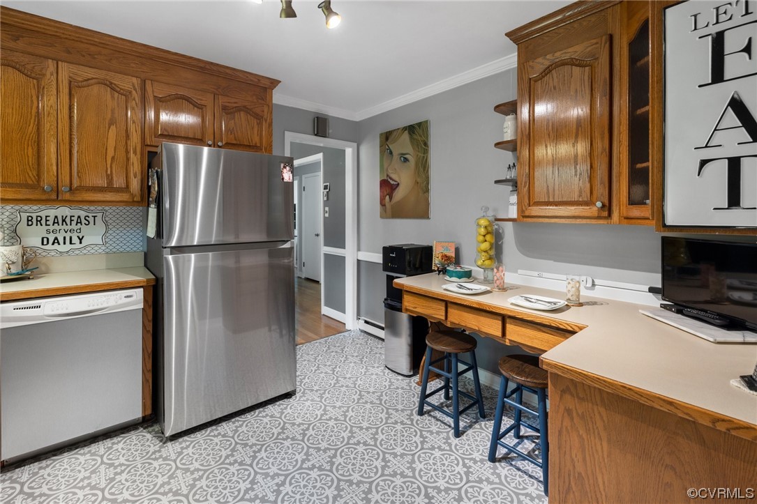 9505 Beach Road Chesterfield, VA 23838 - Photo 10 of 32 a kitchen with a refrigerator and a stove top oven