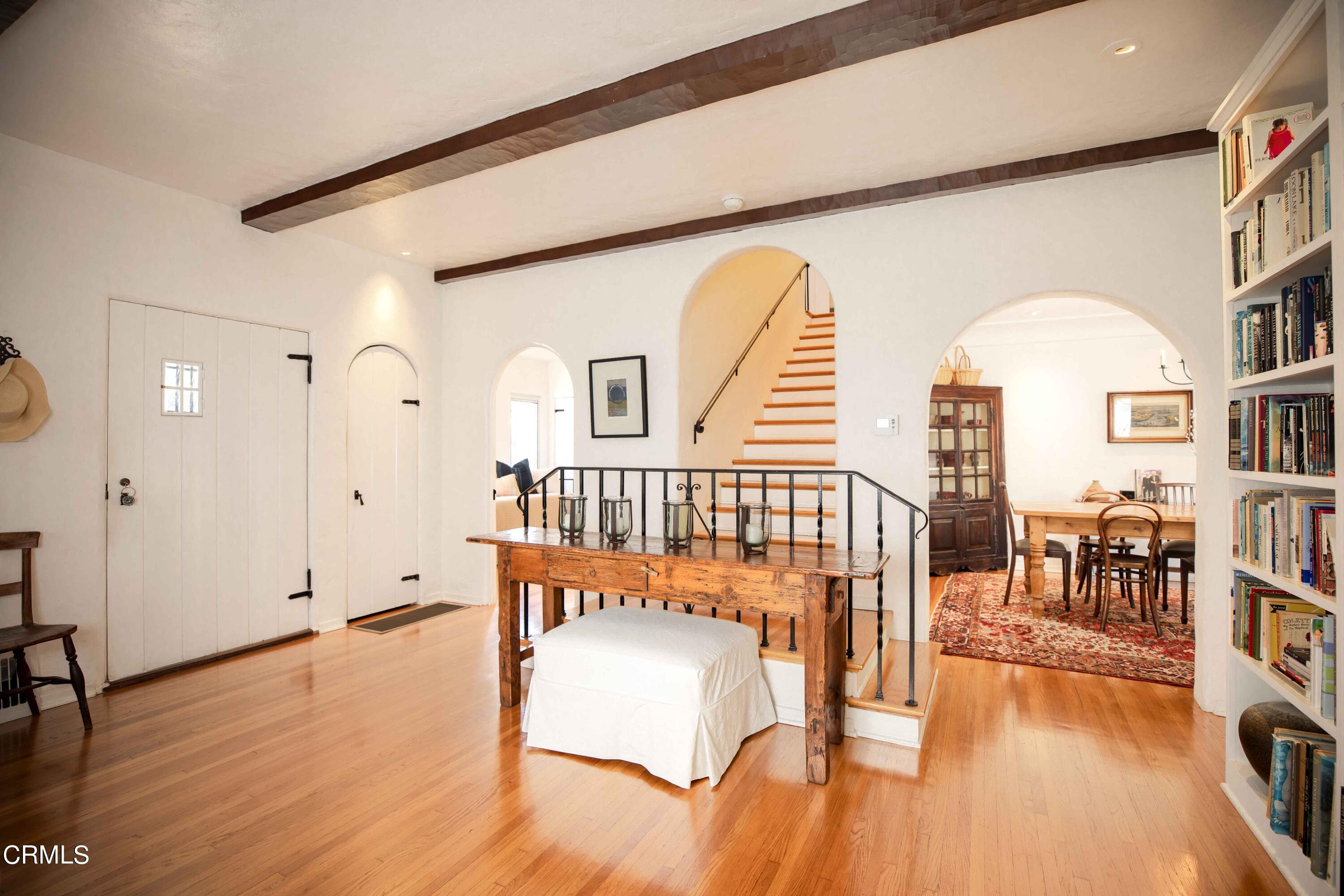 426 South Berkeley Avenue Pasadena, CA 91107 - Photo 15 of 32 a view of a bedroom with furniture and wooden floor