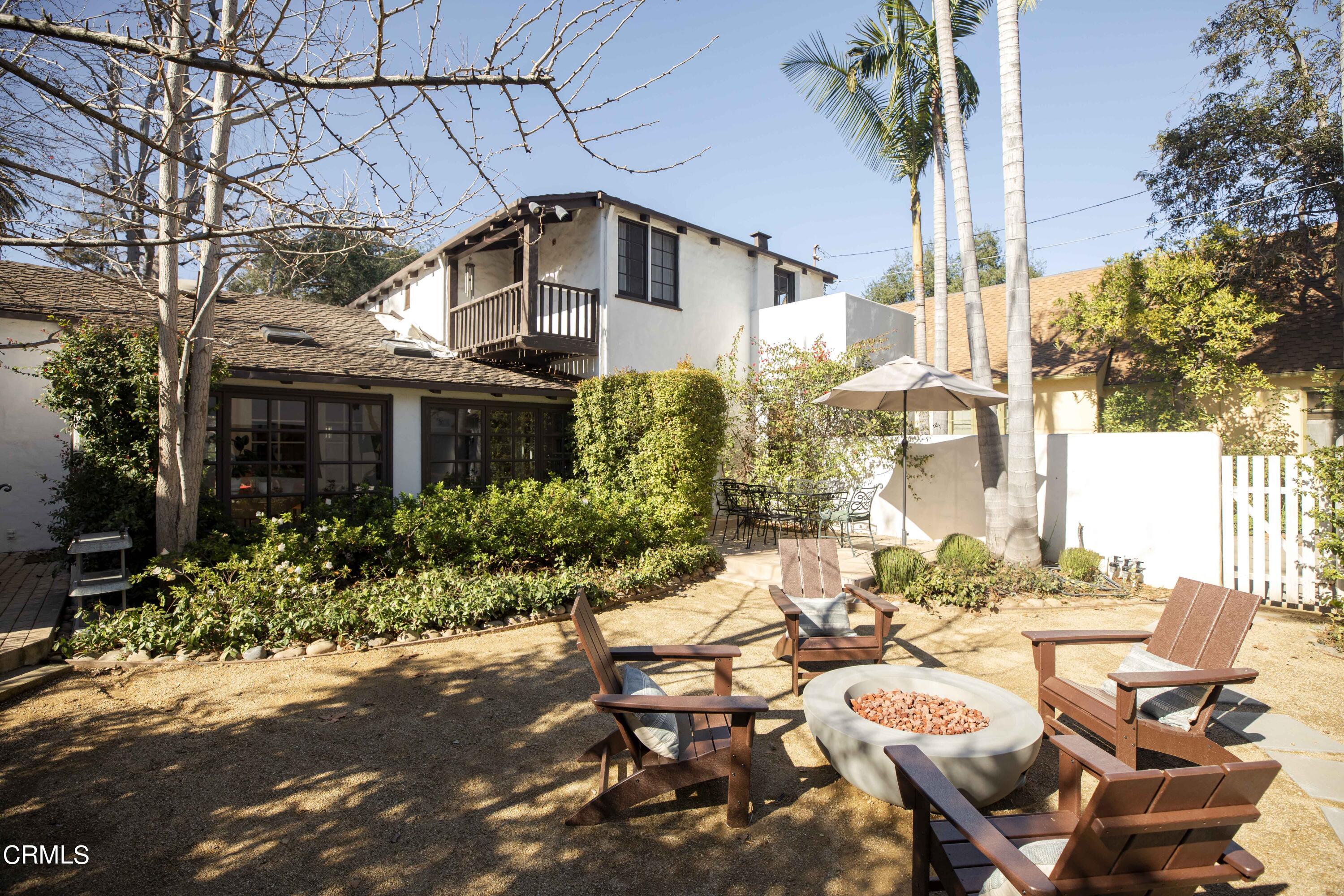 426 South Berkeley Avenue Pasadena, CA 91107 - Photo 21 of 32 a front view of a house with garden
