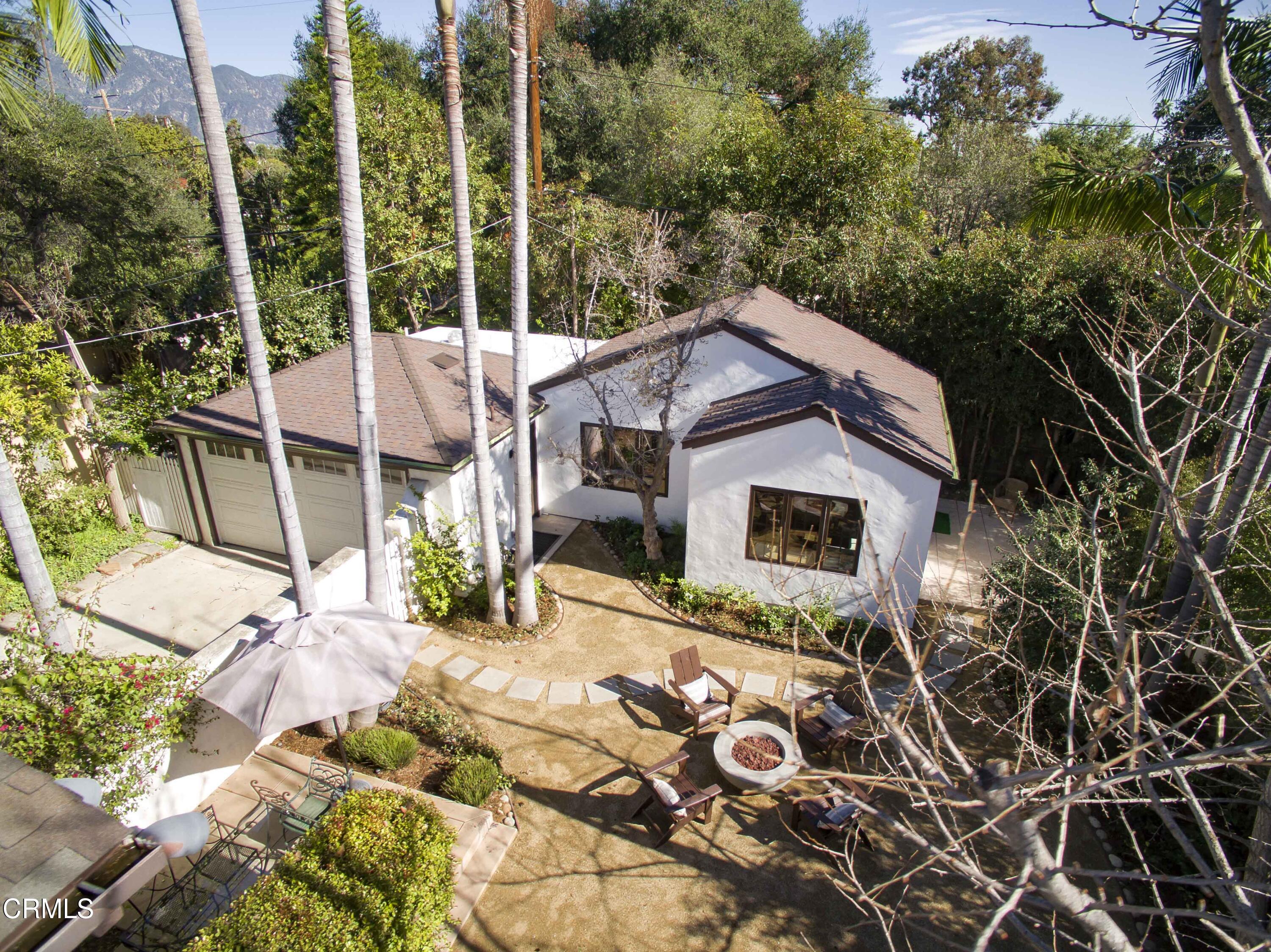 426 South Berkeley Avenue Pasadena, CA 91107 - Photo 31 of 32 a house with trees in front of it