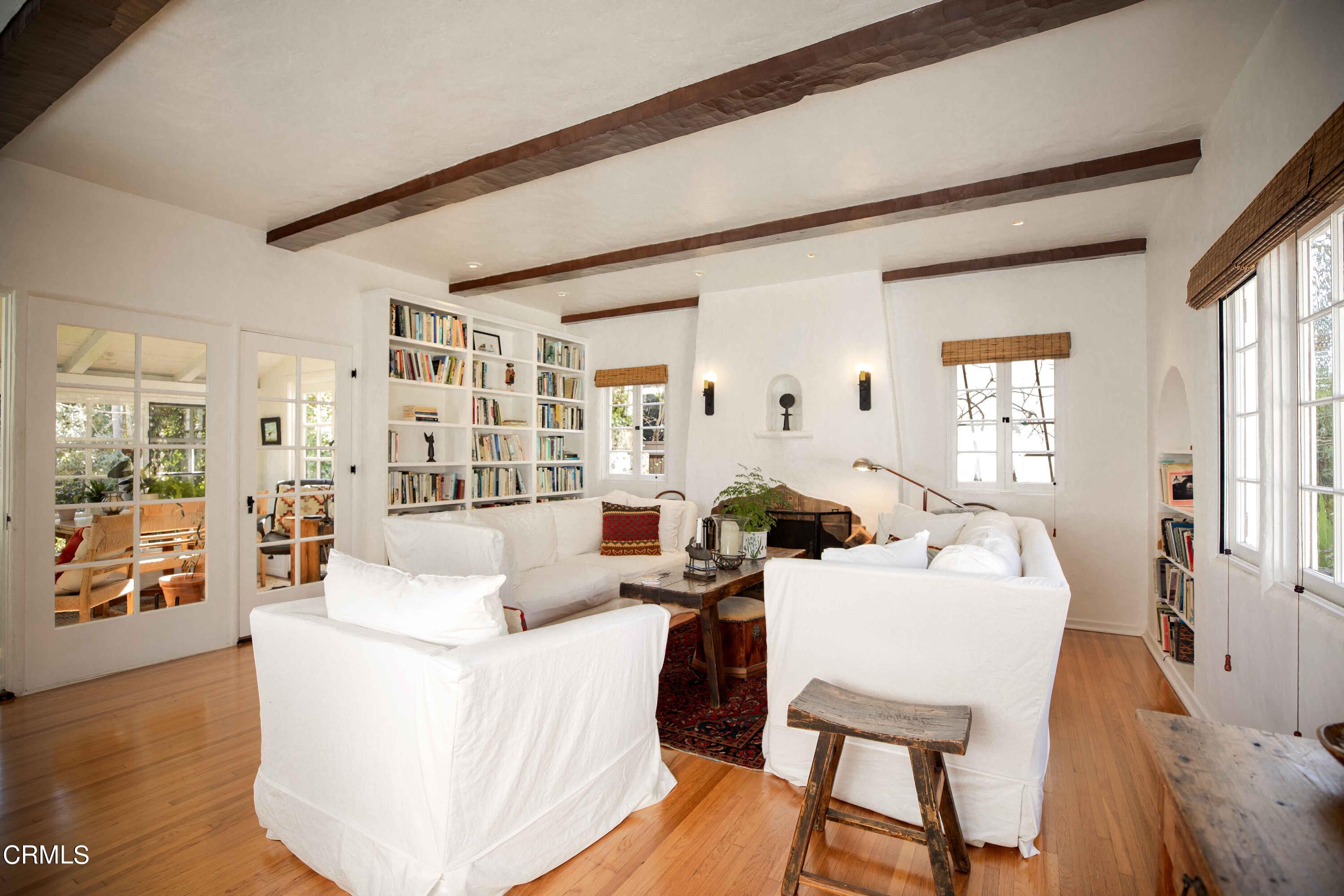 426 South Berkeley Avenue Pasadena, CA 91107 - Photo 6 of 32 a living room with furniture and wooden floor