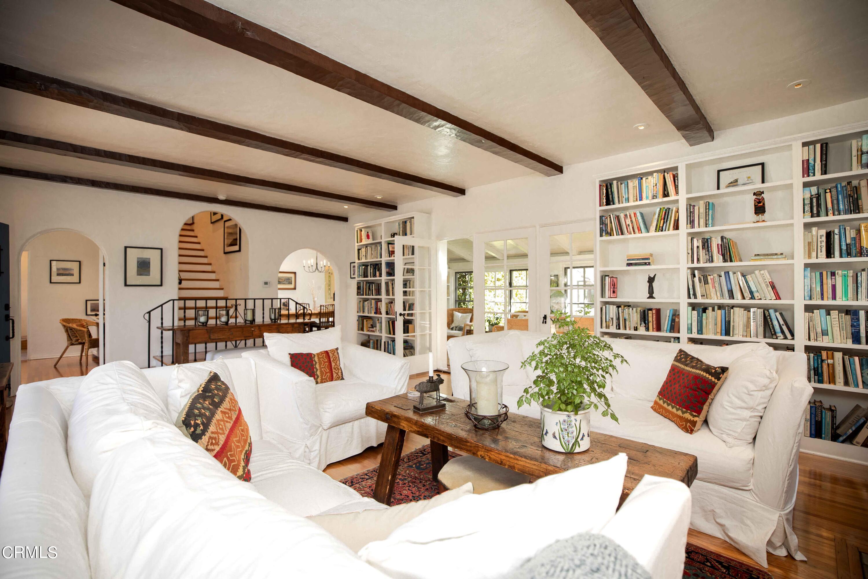 426 South Berkeley Avenue Pasadena, CA 91107 - Photo 7 of 32 a living room with furniture and a large window