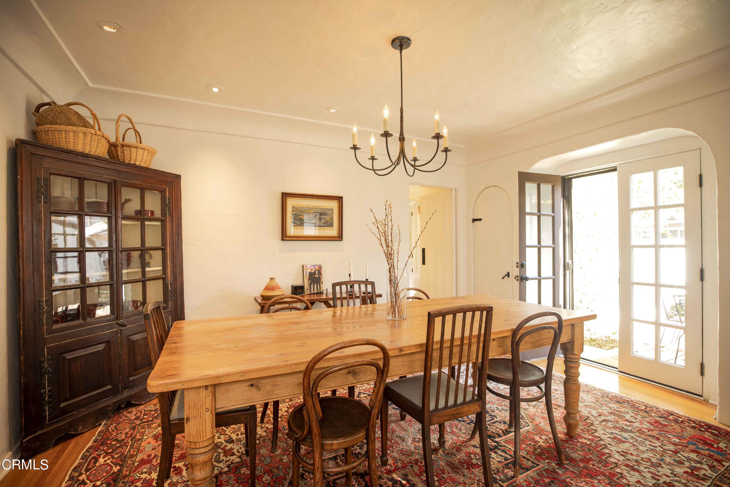 426 South Berkeley Avenue Pasadena, CA 91107 - Photo 9 of 32 a dining room with furniture window and wooden floor