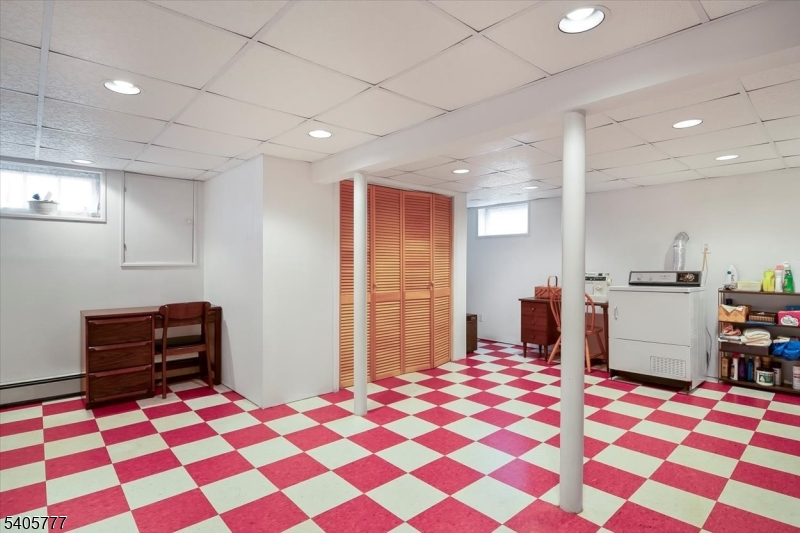 735 Garden Street Union, NJ 07083 - Photo 20 of 29 a bedroom with a bed and a dresser