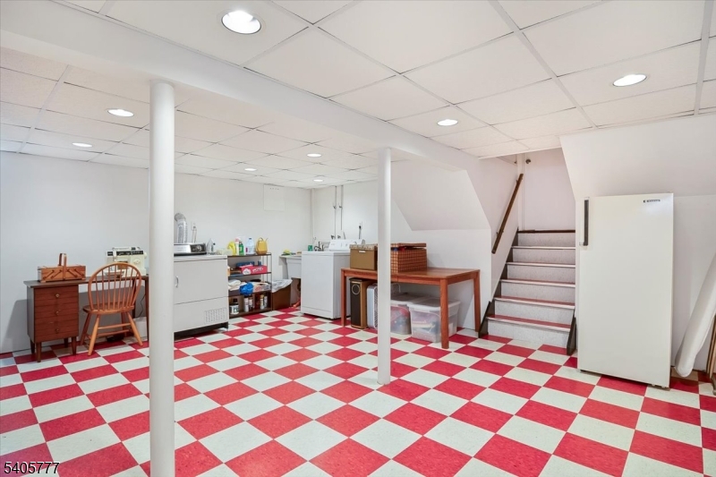 735 Garden Street Union, NJ 07083 - Photo 21 of 29 a bedroom with furniture and a chair