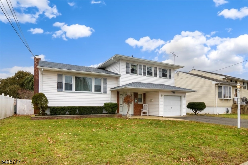 735 Garden Street Union, NJ 07083 - Photo 22 of 29 a front view of a house with a garden
