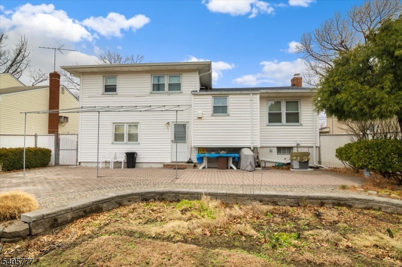 735 Garden Street Union, NJ 07083 - Photo 27 of 29 a front view of a house with swimming pool and furniture