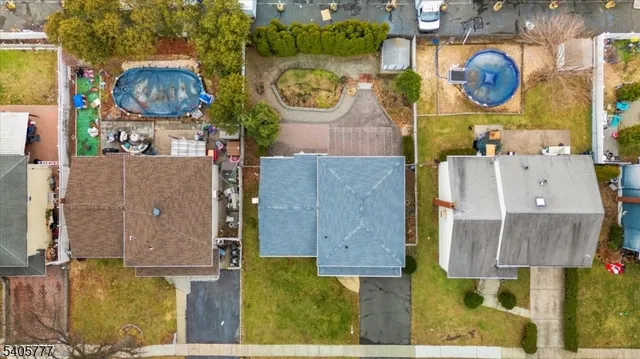 a view of multiple houses with a yard