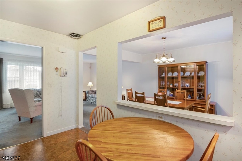 735 Garden Street Union, NJ 07083 - Photo 8 of 29 a view of a living room and dining room